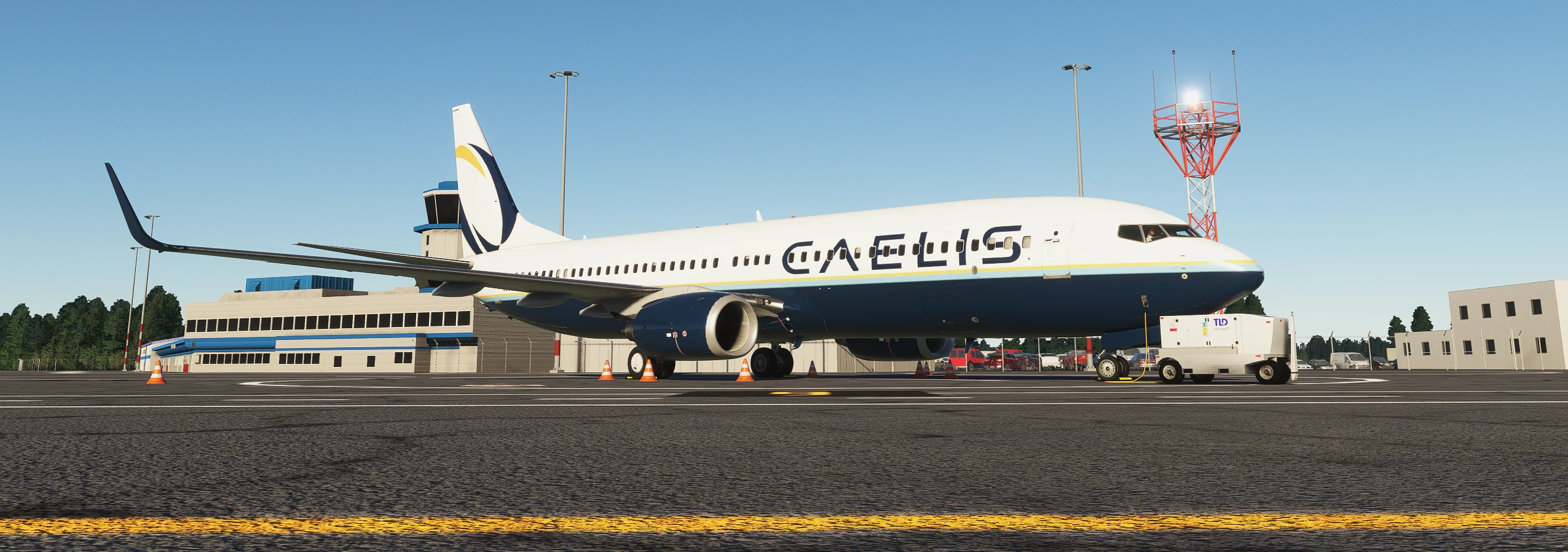 Caelis aircraft in pearl, midnight blue and gold on a sunlit airport apron
